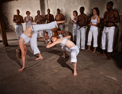 Capoeria Fighters Kicking and Dodging